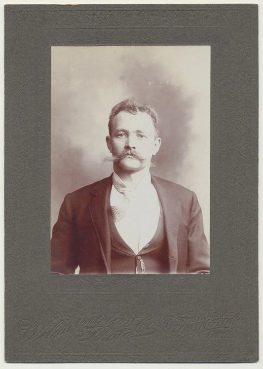 Disheveled Man w/ Scraggly Hair, Off Center Tie. Mounted Silver Print. Delaware.