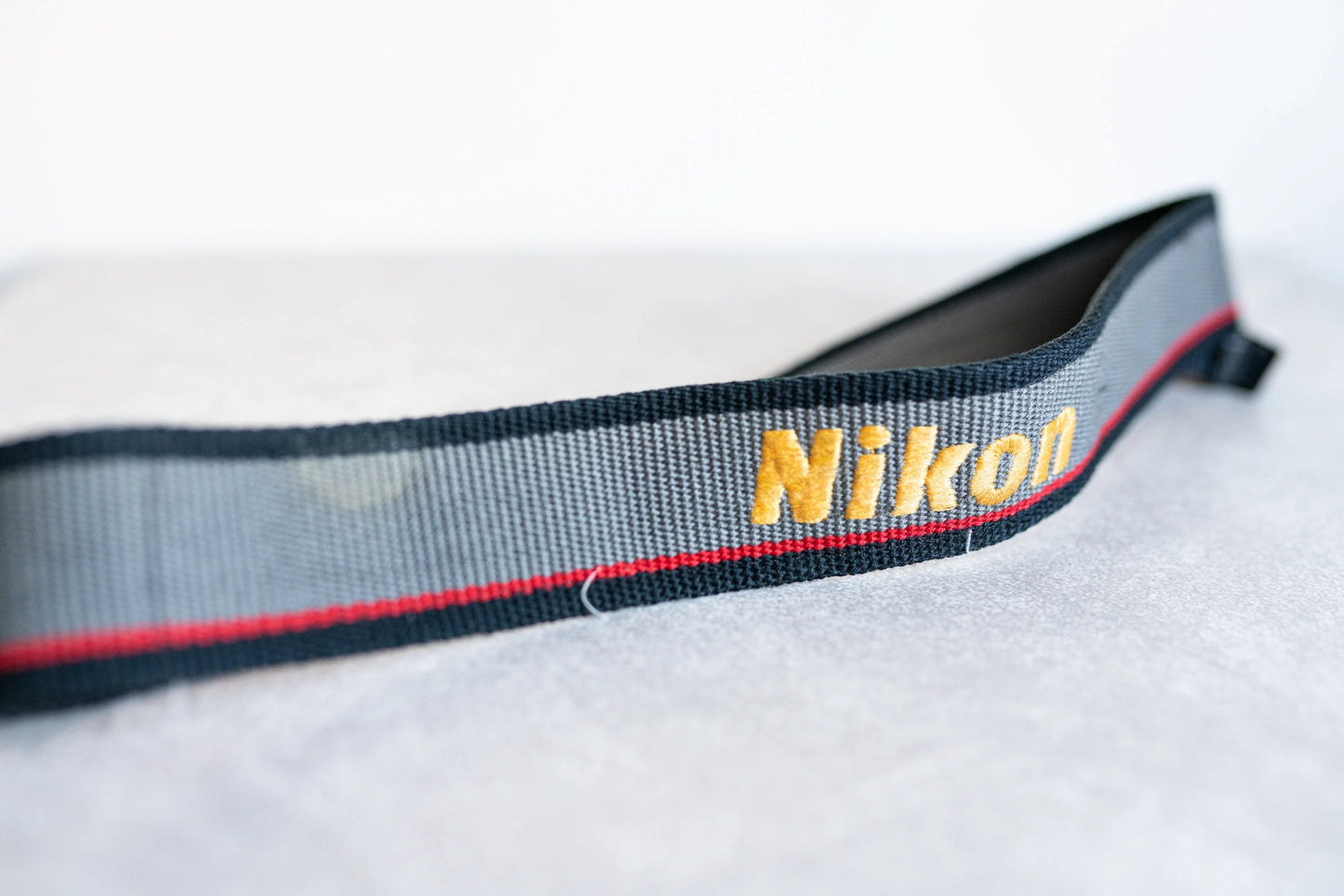 Nikon Vintage Strap - Grey / Black w/ Red Pin Stripe