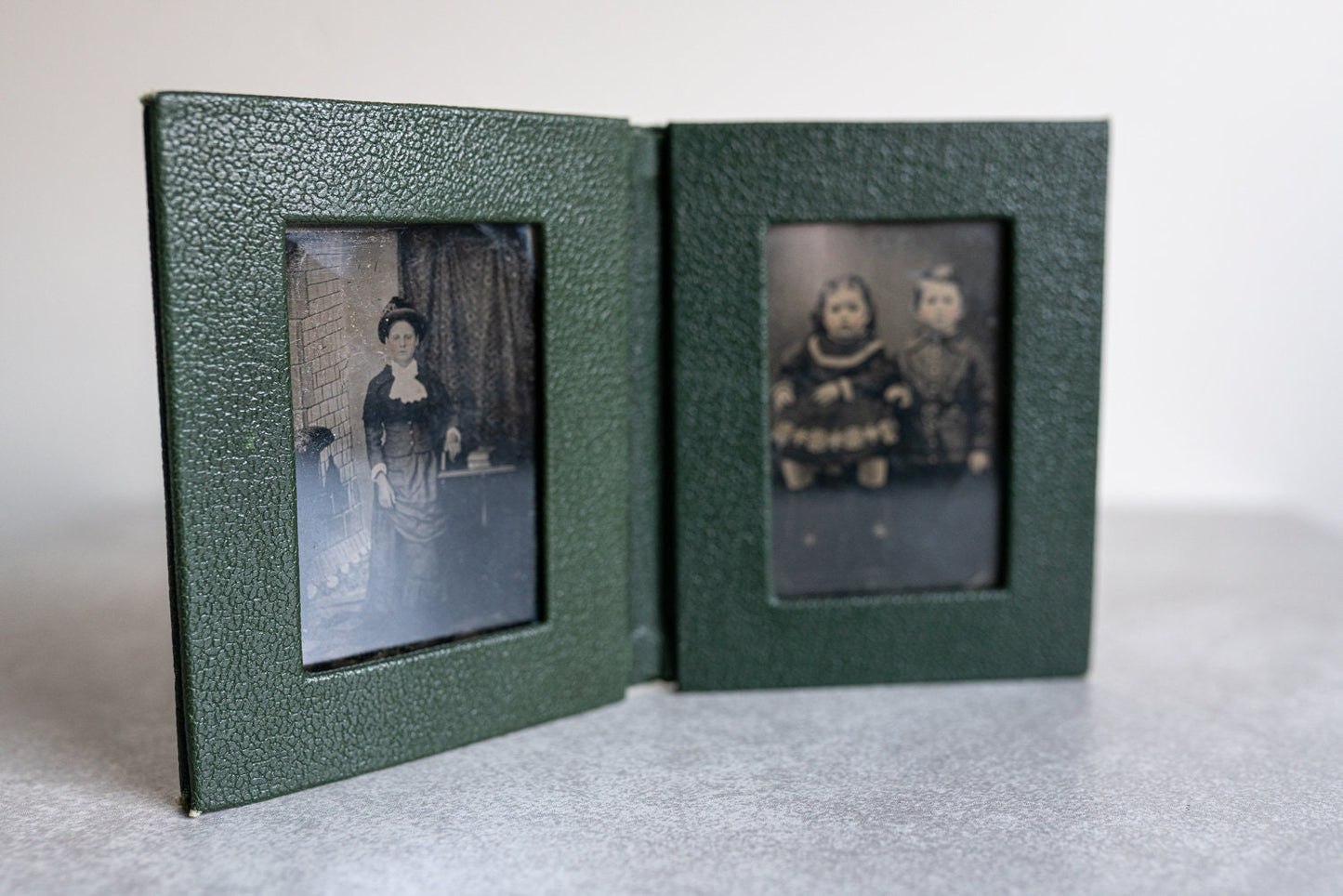 Two Tintypes w/ Some Hand Tint in Small Green Leather Portfolio Album