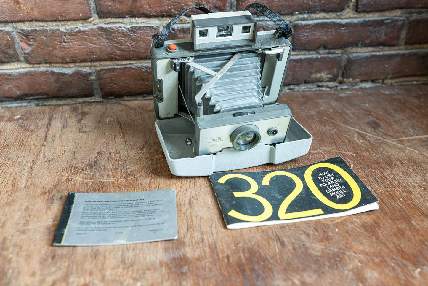 Polaroid Automatic Land Camera Model 320 w/ Manual - Sold AS IS