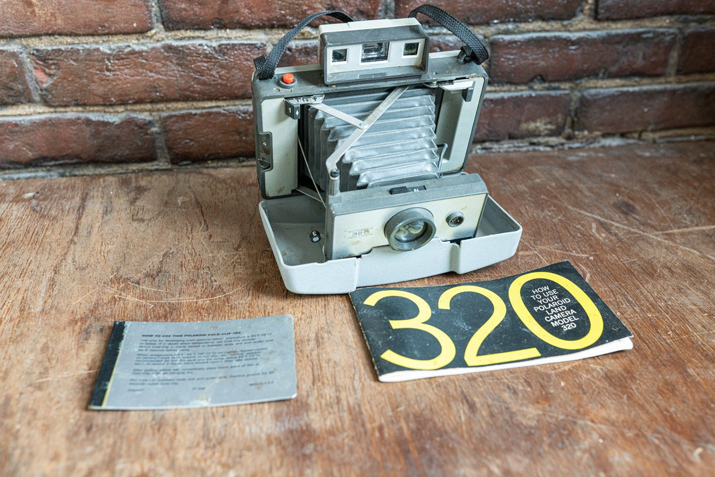 Polaroid Automatic Land Camera Model 320 w/ Manual - Sold AS IS