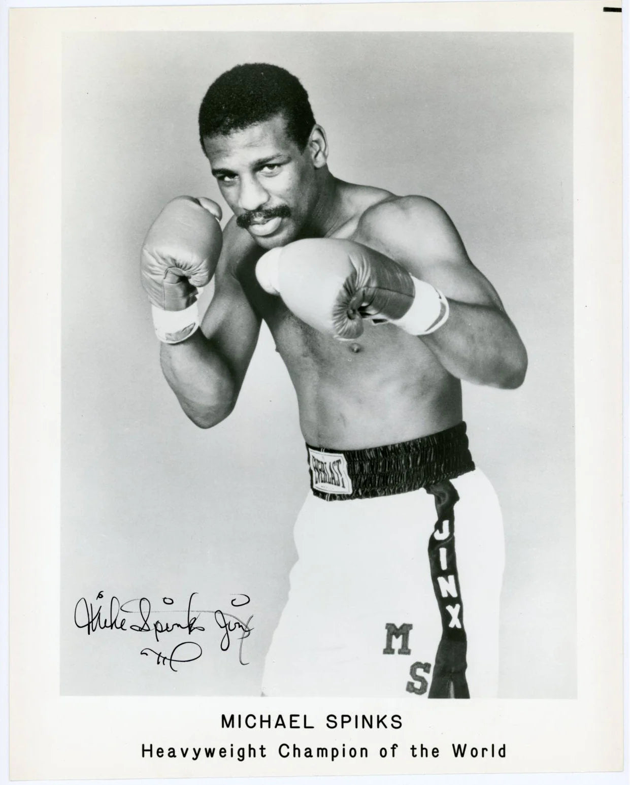 Michael Spinks - Heavyweight Champion of the World SIGNED PHOTO