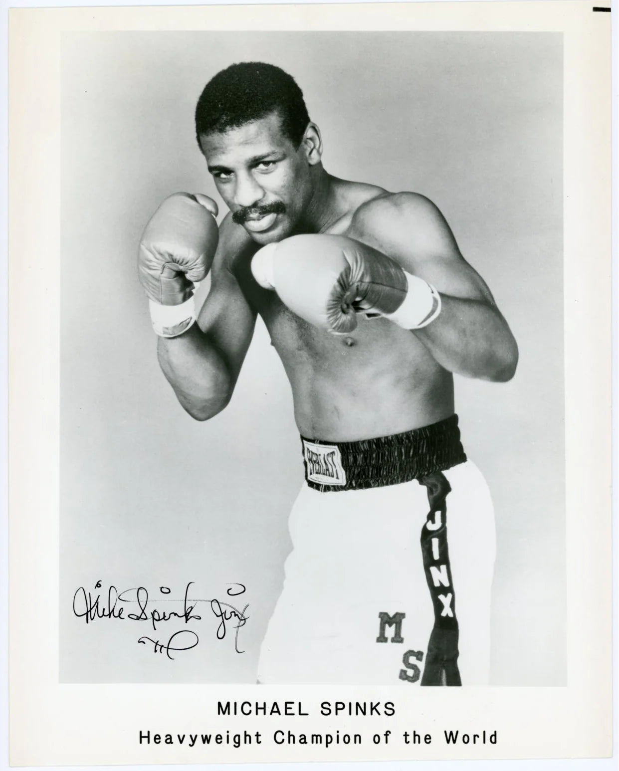 Michael Spinks - Heavyweight Champion of the World SIGNED PHOTO