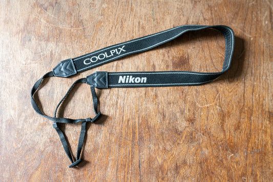 Black and Grey Nikon Coolpix Strap