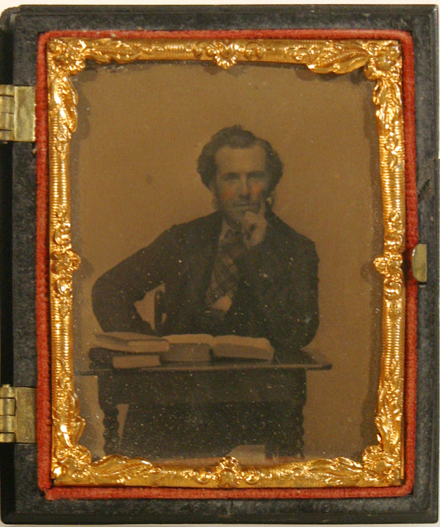 MAN AT DESK W/ 3  BOOKS AMBROTYPE IN UNION CASE NINTH PLATE 1850'S
