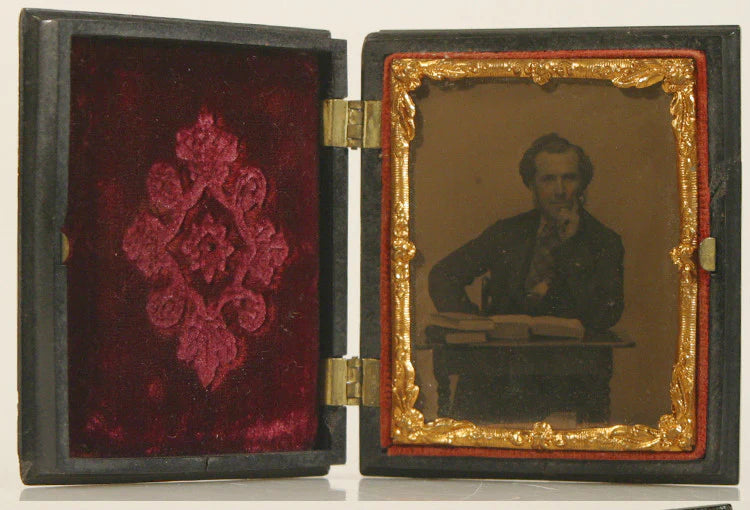 MAN AT DESK W/ 3  BOOKS AMBROTYPE IN UNION CASE NINTH PLATE 1850'S