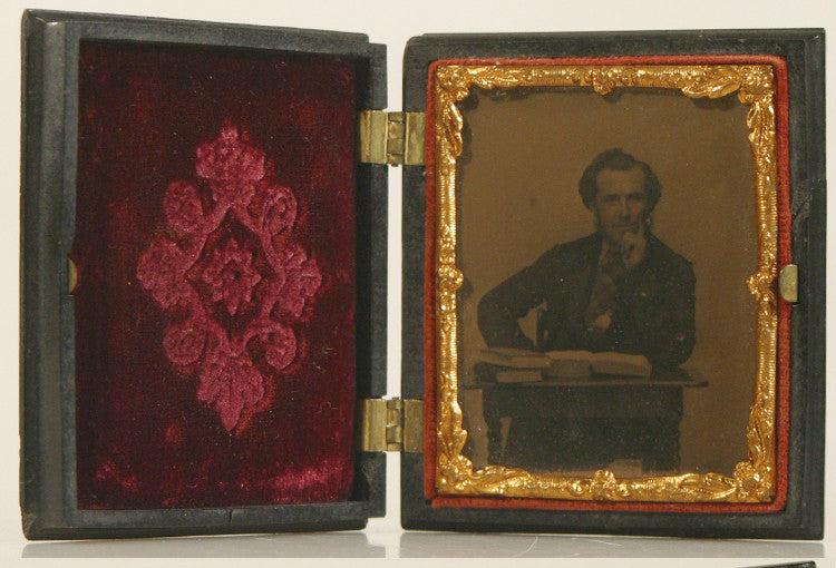 MAN AT DESK W/ 3  BOOKS AMBROTYPE IN UNION CASE NINTH PLATE 1850'S