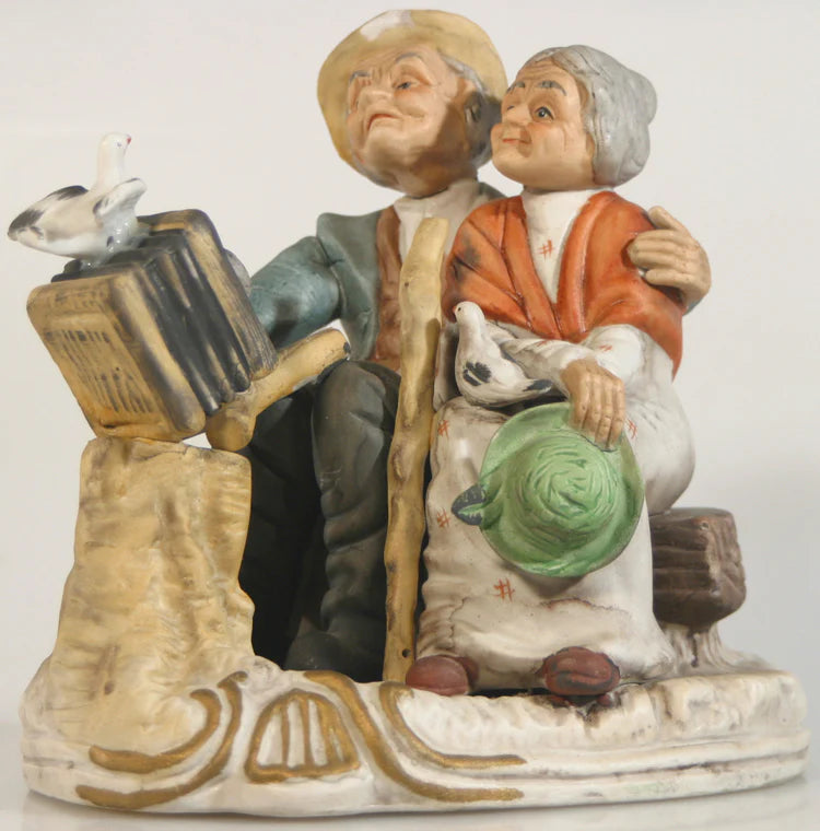 EDLERLY COUPLE WATCH THE BIRDIE PORCELINE FIGURE