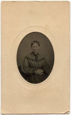 CIVIL WAR ERA OVAL OLDER LADY WITH NICE DRESS TINTYPE