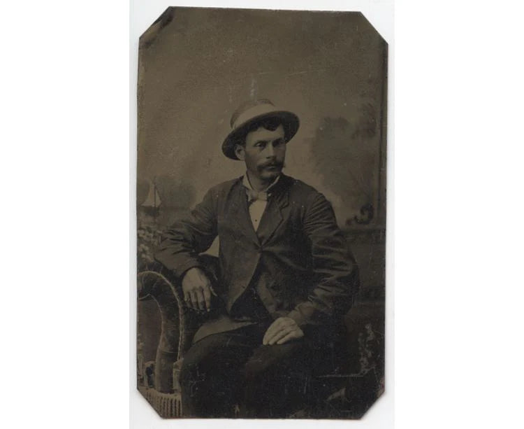 CIVIL WAR ERA TINTYPE MAN W/ STRIPED HAT AND VELVET CHAIR
